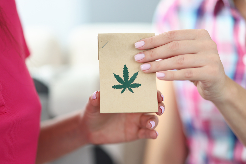 Cannabis products in a paper bag with label