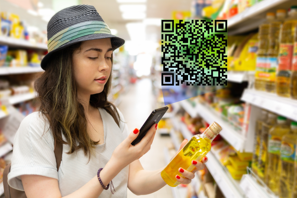 Customer scanning a QR code to authenticate against label counterfeiting