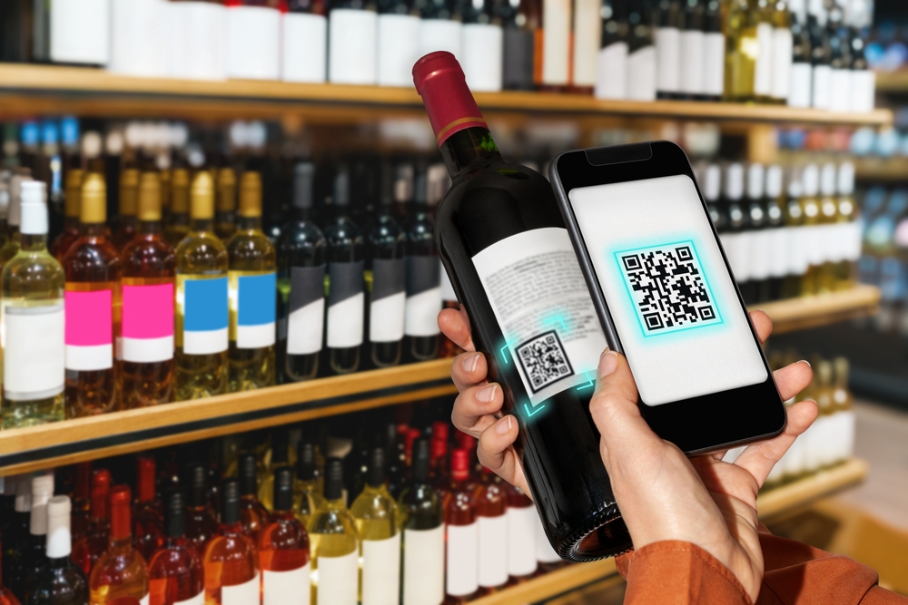 Scanning a barcode on a bottle of wine with a smartphone